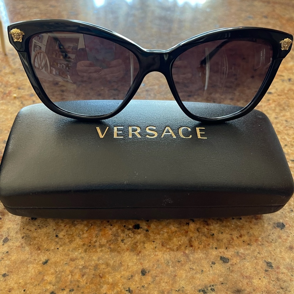 Versace Sunglasses.  Like new condition.  Wore once. Includes case